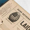 Close-up of a Hatortempt's biodegradable egg cartons with an American flag design and text.