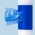 Blue poop-bag dispenser with a plastic bag attached on a light blue background.