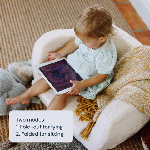 Child using a tablet on a Todale's multifunctional chair that transforms into a bed, with text indicating two modes.