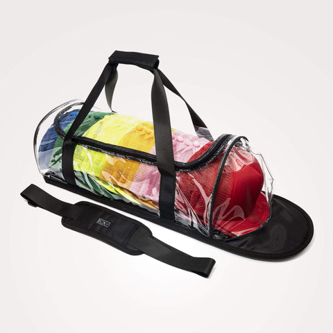 Clear baseball hat storage duffel bag with colorful caps on a white background