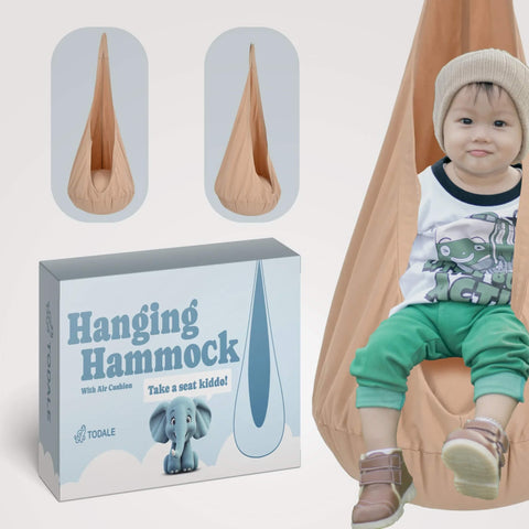 Todale's hanging hammock for children with packaging and a child sitting in it.