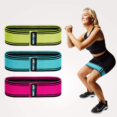 Woman exercising with zenKeyz's resistance bands on a white background